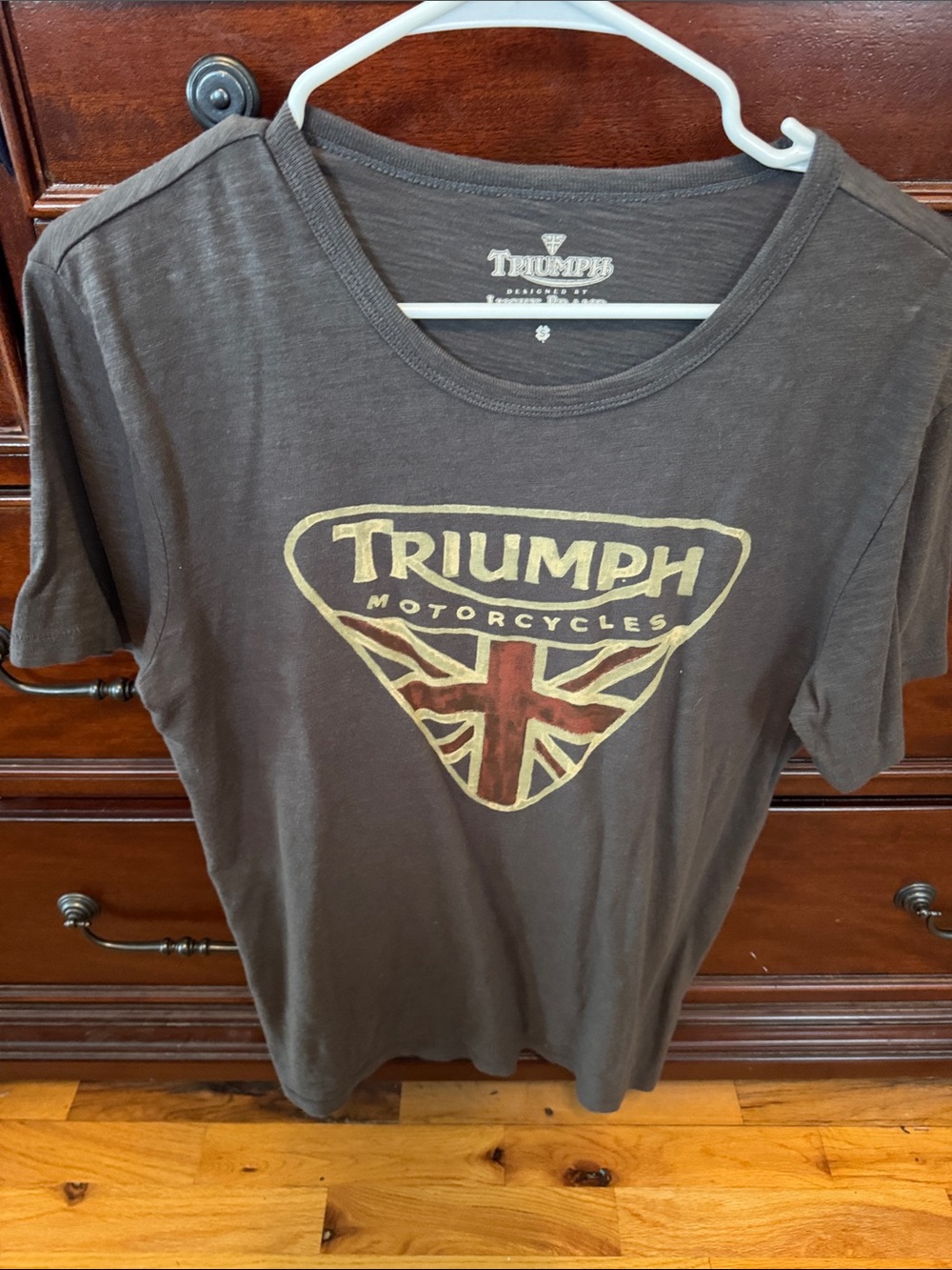 Triumph Brown Graphic Tee with Gold and Red Logo